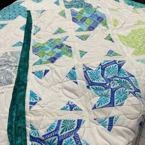 Elegant Blue and Green Patchwork Quilt